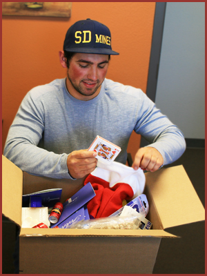 Chance opening his care box