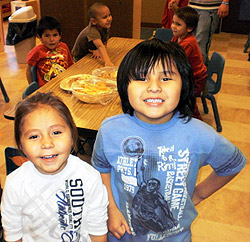 Native American children smiling at camera